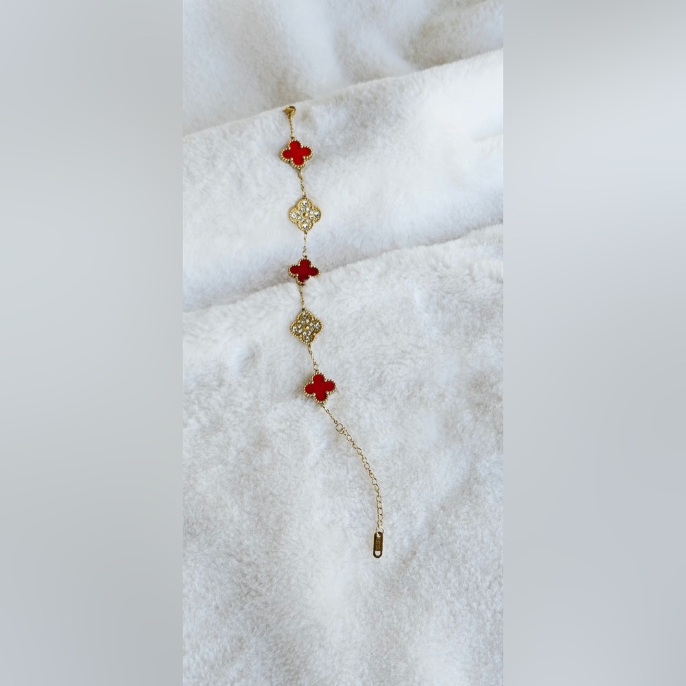 Elegant Gold and Red Clover Bracelet